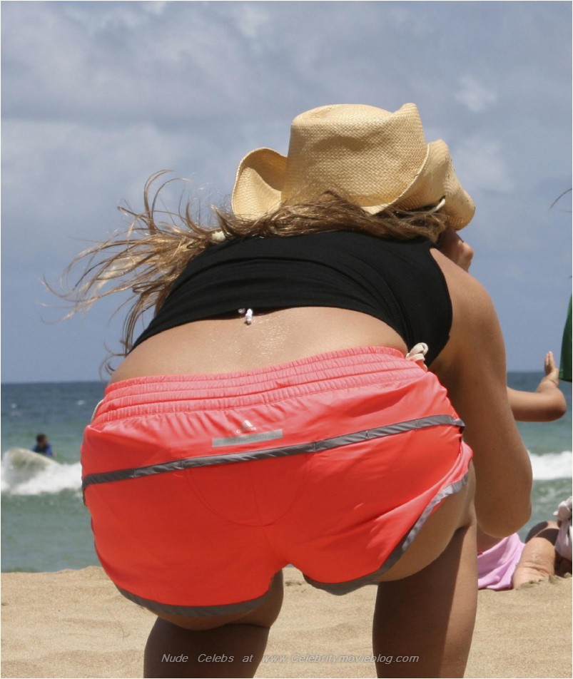 Jennifer Aniston showing her ass in a bikini while surfing Jennifer Aniston showing her ass in a bikini while surfing